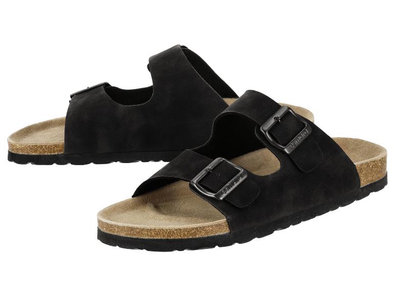 Schwarze Sandalen mit zwei Riemen, Schnallen und Korksohle.
