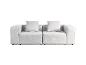 Hellgraues modulares Zweisitzer-Sofa mit passenden Kissen.