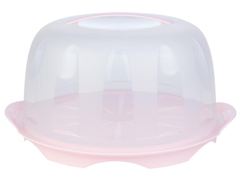 Eine rosa Plastik-Tortenbox mit durchsichtigem Deckel.