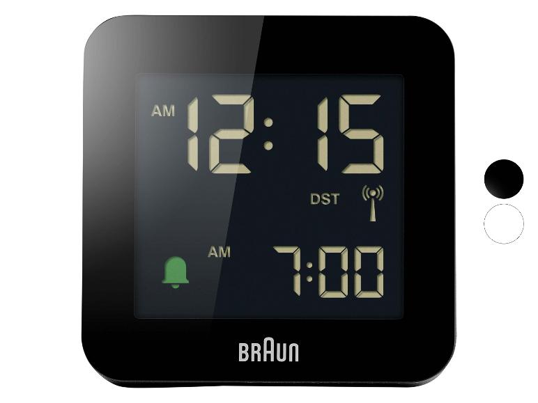 Schwarzer digitaler Wecker mit Anzeige von 12:15 Uhr und Wecker auf 7:00 Uhr eingestellt.