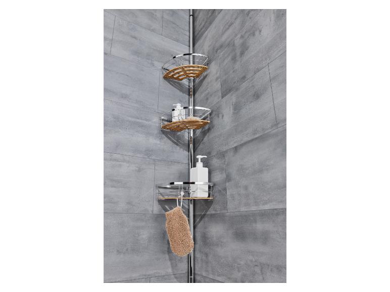 Ein eckiger Duschständer mit drei Ablagen und einem Waschlappen.