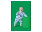 Baby in blauem Dinosaurier-Outfit, das sich auf einen grünen Pouf stützt.