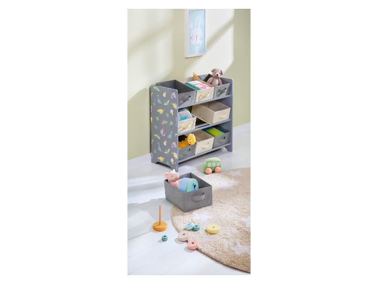 Grauer Aufbewahrungsschrank mit Dinosaurier-Druck, gefüllt mit Spielzeug und Büchern.