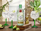 Tanqueray Rangpur Lime Gin mit grünen Gläsern und Limetten