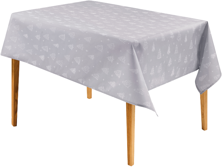 Graue Tischdecke mit weißem Muster aus Weihnachtsbäumen und Sternen, auf einem Tisch ausgebreitet.