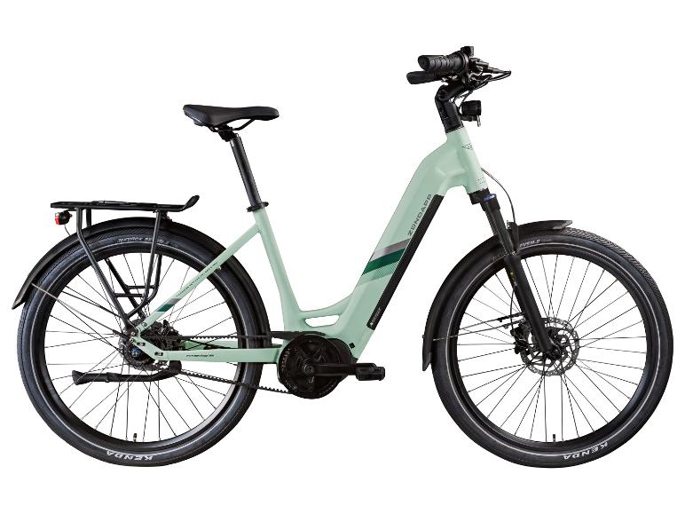 Hellgrünes Elektrofahrrad mit Gepäckträger und schwarzen Reifen, ausgestattet mit Riemenantrieb.