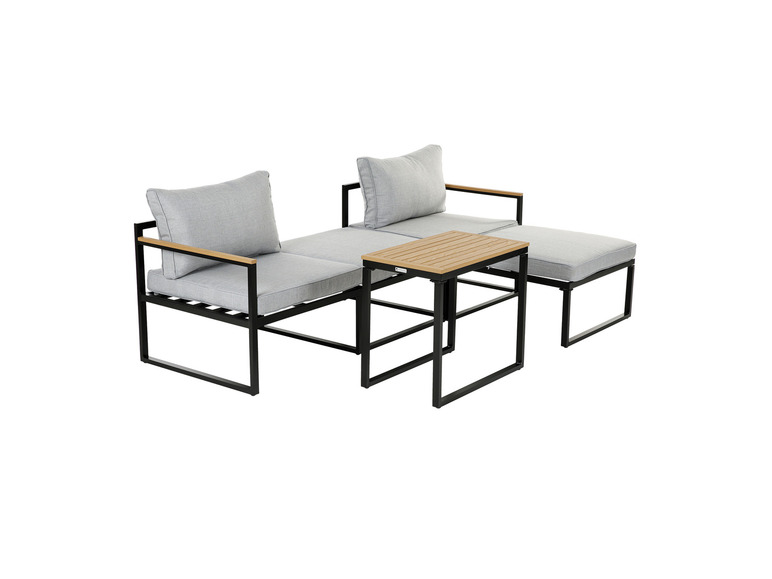 Ein Set aus zwei Stühlen und einem Couchtisch aus schwarzem Metall mit grauen Kissen.