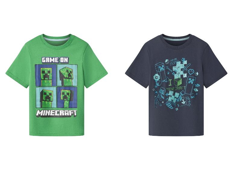 Zwei Minecraft Kinder-T-Shirts: ein grünes mit „GAME ON“ und ein dunkelblaues mit „I LOVE MINECRAFT“.