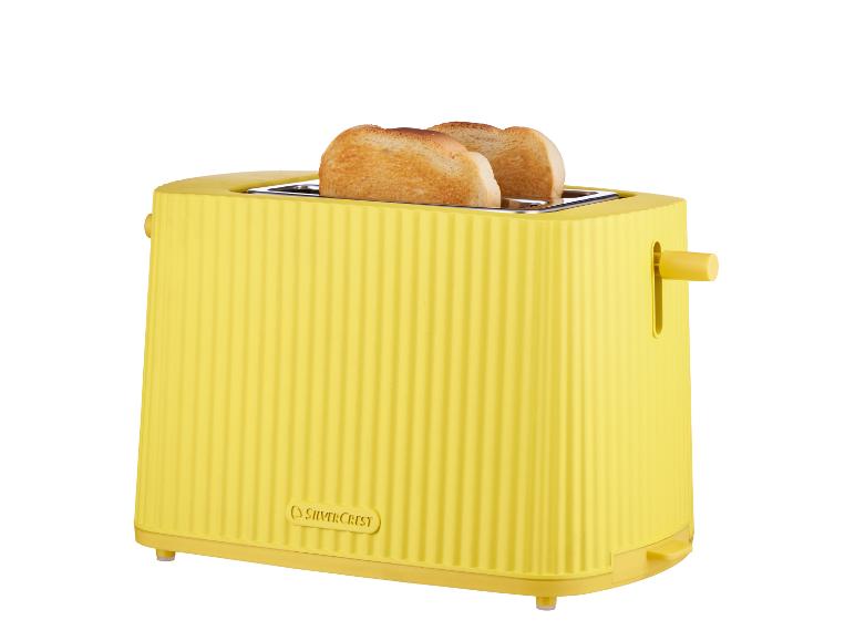 Gelber SilverCrest Toaster mit zwei Scheiben geröstetem Brot