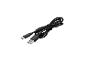 Schwarzes USB-Kabel mit USB-A und USB-C Anschlüssen, ordentlich aufgerollt.