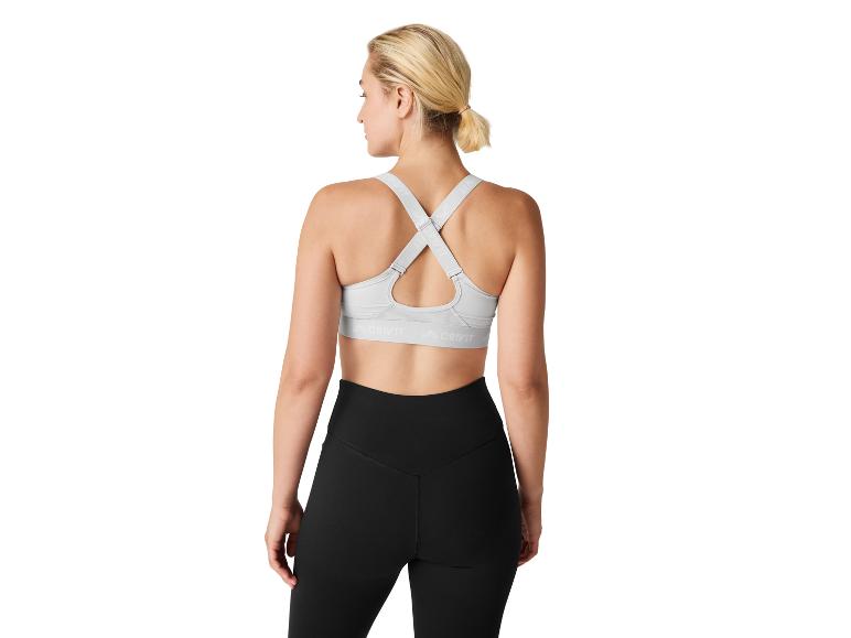 Crivit Sport-BH und schwarze Leggings.