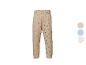 Beige Jogginghose mit schwarzen Punkten, elastischem Bund und Bündchen.