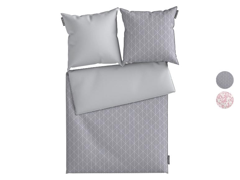 MICHALSKY Bettwäsche mit grau-weißem geometrischem Muster und unifarbenem Grau, mit zwei Kissen.