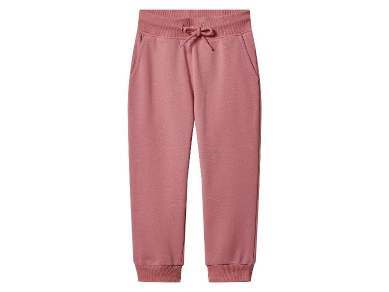 Rosa Jogginghose für Damen mit Kordelzug und Taschen.