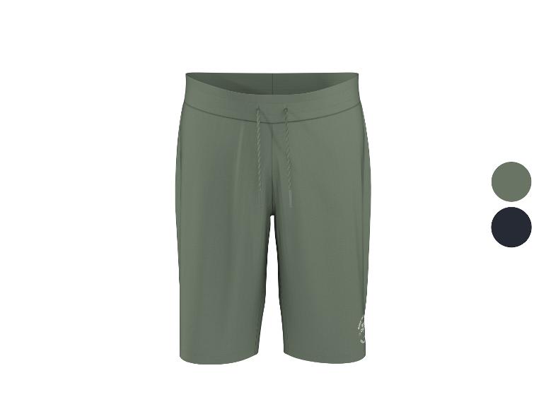 Grüne Sporthose mit verstellbarem Kordelzug und kleinem Logo.