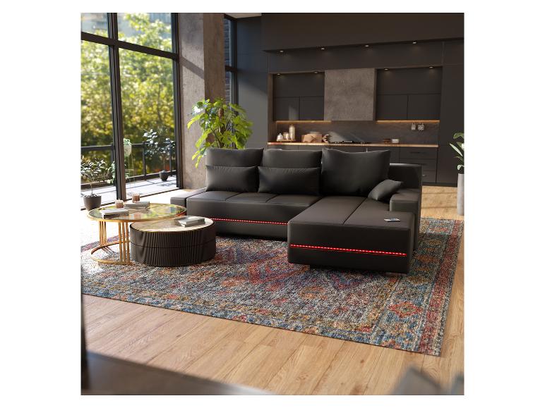 Eine schwarze Lederecke mit LED-Beleuchtung in einem modernen Wohnzimmer.