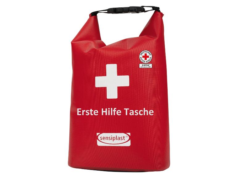 Rote Erste-Hilfe-Tasche mit weißem Kreuz und dem Text „Erste Hilfe Tasche“.