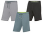 Drei Shorts in grau, blau und schwarz.
