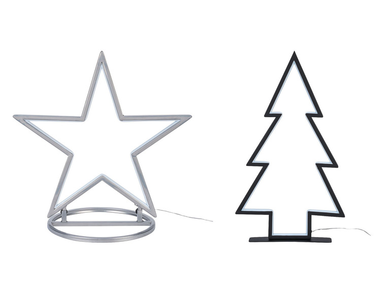 Eine sternförmige silberne und eine tannenbaumförmige schwarze Lampe.