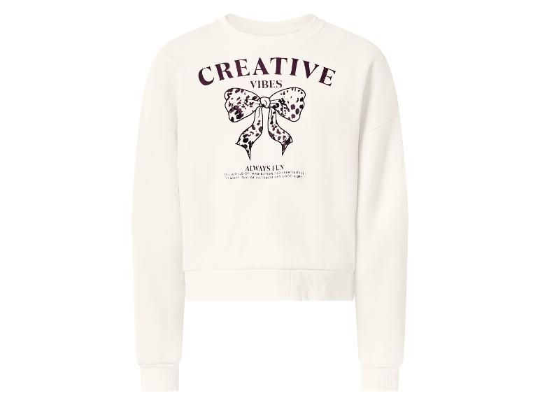 Cremefarbenes Sweatshirt mit „Creative Vibes“-Schriftzug und gepunkteter Schleifengrafik.