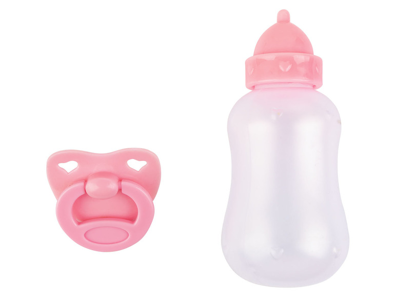 Eine rosa Babyflasche und ein Schnuller.