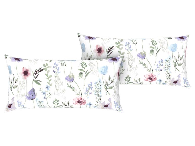 Zwei Kissen mit Blumenmuster.