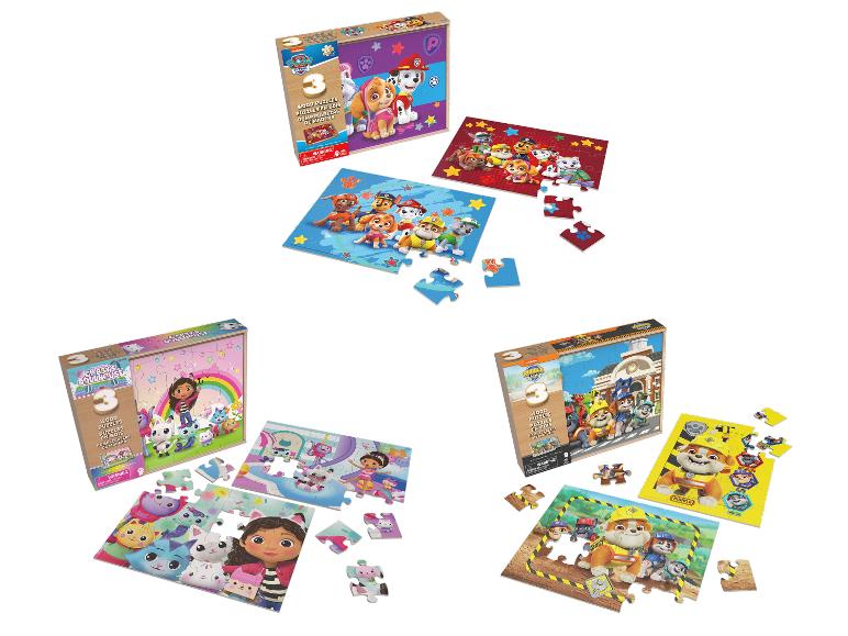 Drei Holzpuzzles mit Welpen- und Katzenfiguren, darunter eines mit einem Regenbogen.