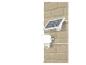 LED-Solarstrahler mit Bewegungssensor an einer Ziegelwand.