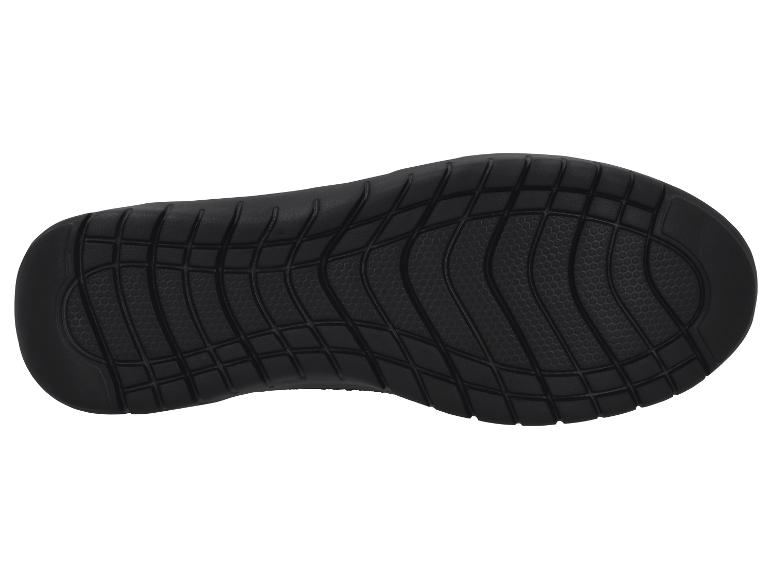 Schwarze Sportschuhsohle mit gerilltem Muster