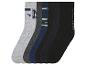 Sechs Paar Socken in verschiedenen Farben und Mustern.