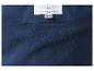 Pflegeetikett mit dem Text „KEEP AWAY FROM FIRE“ auf blauem Fleece