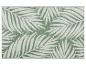 Grüner Teppich mit Palmenblattmuster