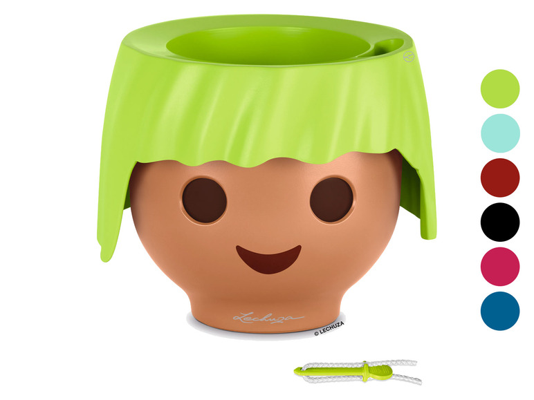 Ein grüner Lechuza-Blumentopf mit einem fröhlichen Gesicht