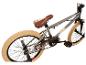 Graues BMX-Fahrrad mit braunem Sattel und beigen Reifen.