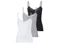 Drei weiße, graue und schwarze Tanktops mit Spitze.