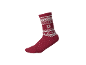 Rote Weihnachtssocke mit weißen Schneeflocken und geometrischen Mustern.