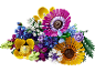 Ein bunter Spielzeug-Blumenstrauß mit Gänseblümchen, Rosen und anderen Blüten.