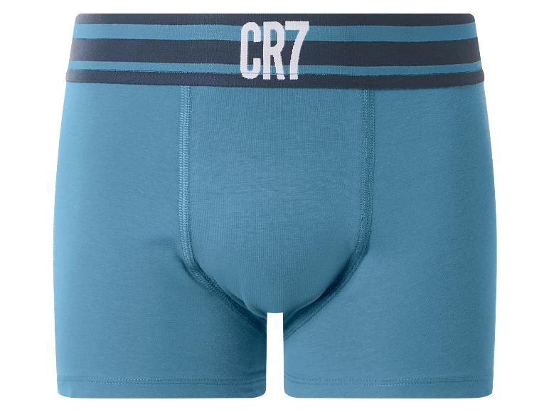 Blaue Herren-Boxershorts mit gestreiftem Bund und weißem Text.