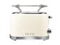 Cremefarbener Retro-Toaster mit Chromdetails und der Aufschrift „1973“ auf der Vorderseite.