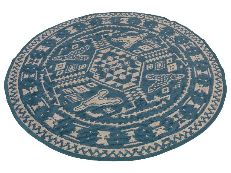 Runder Teppich in Blau und Weiß mit geometrischem Muster.