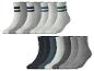 Zwölf Paar Socken in verschiedenen Farben und Stilen, darunter gestreifte und einfarbige.