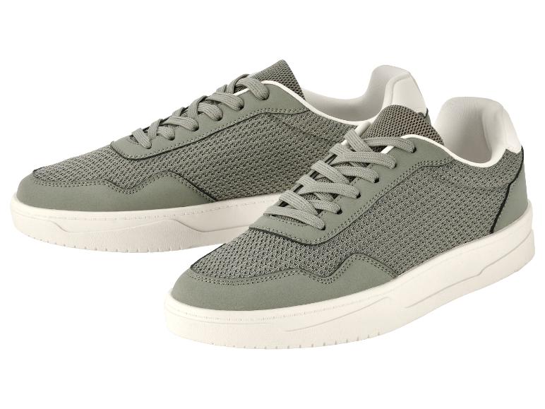 Ein Paar graue Turnschuhe mit weißen Details