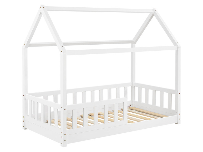 Weißes Kinderbett mit Baldachin.