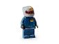 LEGO Minifigur eines Rennfahrers in blauem Red Bull Anzug und grauem Helm.