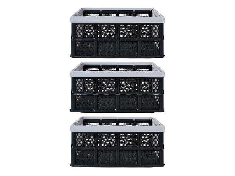 Drei schwarze faltbare Kisten mit grauen Rändern, übereinander gestapelt.