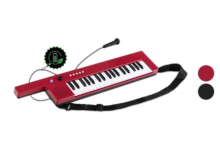 Roter Synthesizer mit Mikrofon und Gurt, mit einem Symbol für wiederaufladbare Batterie.