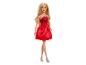 Blonde Barbie-Puppe in rotem Kleid und silbernen High Heels.