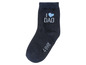 Eine dunkelblaue Socke mit dem Schriftzug 'I love Dad' und '4ever'.