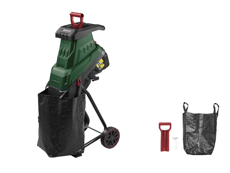 Gartenhäcksler mit schwarzem Auffangsack, rotem Stopfer und Werkzeugen.