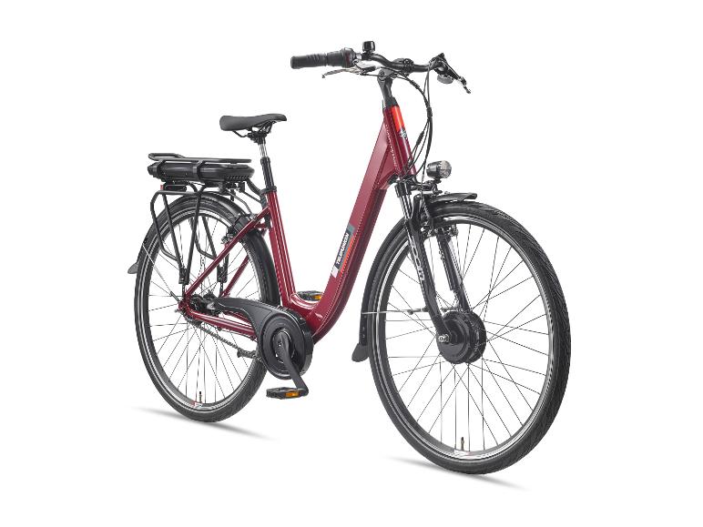 Rotes E-Bike mit Gepäckträger und Vorderlicht.